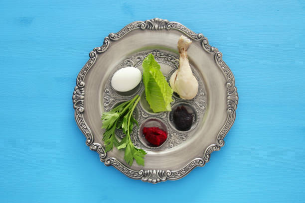 istock Pesah celebration concept (jewish Passover holiday). Traditional pesah plate with five symbols 921262268