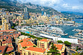Monaco. Views of expensive yachts as well as on the track Formula-1 in a narrow street in Monaco
