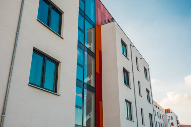 istock low angle view of red and white facaded apartment house 921267168