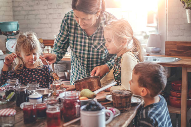 istock Preparing Homemade Berry Jam and Canning in Jars 921267190