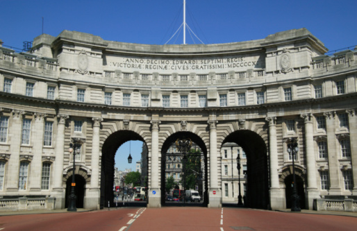 Admiralty Arch was completed in 1912 and commissioned by Edward V11 in memory of his mother Queen Victoria. It provides an archway and pedestrian access between The Mall and Trafalgar Square.