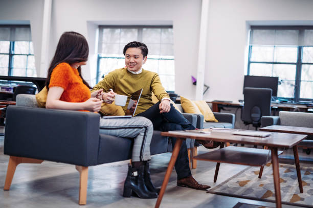 istock Two young entrepreneurs making decisions on Monday morning 921277538