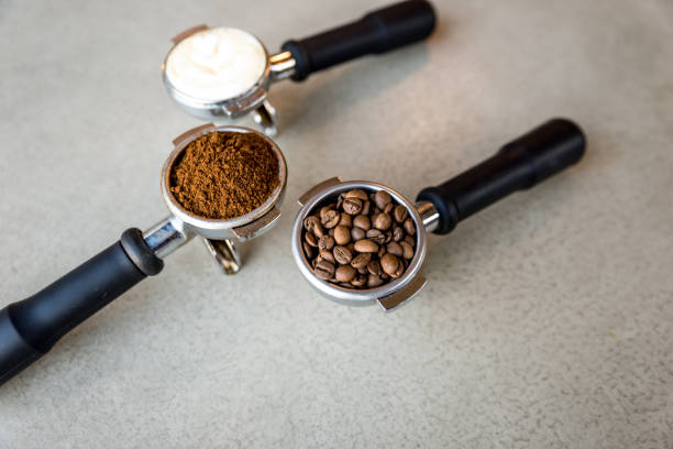 istock Ground coffee in porta filter with beans 921280164