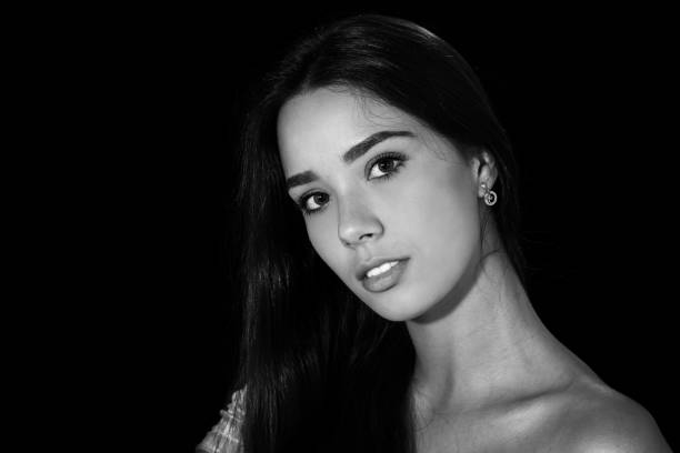 istock Young Lady Studio Headshot in Monochrome 921280366