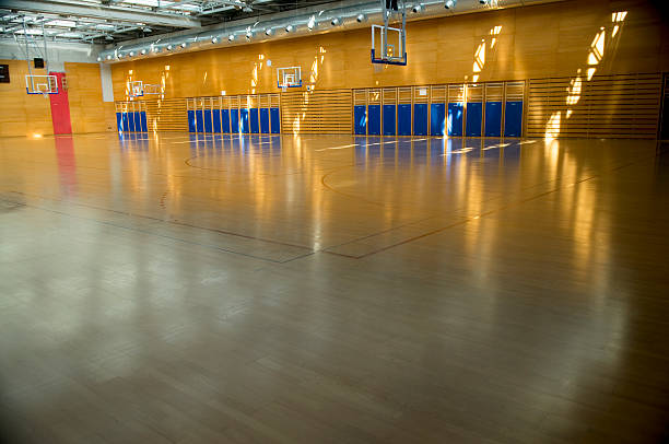istock Empty Gymnasium Sports Centre Hall in Morning Sun 92128150