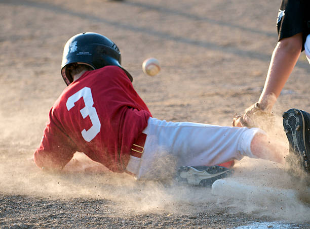 scivolare in terza - baseball player foto e immagini stock