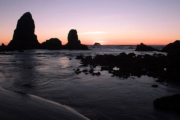 Puesta de sol, Cannon Beach Oregon coast - foto de stock