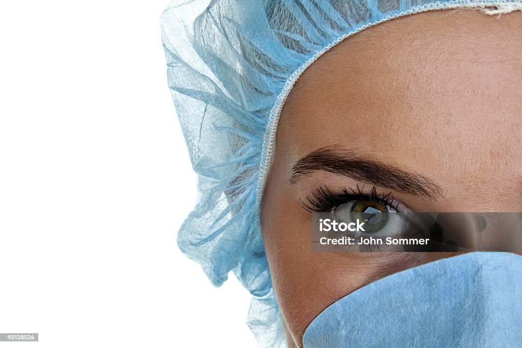 Primo piano di un professionista in campo medico - Foto stock royalty-free di Mascherina di protezione