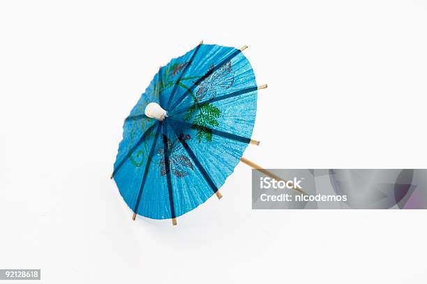 Blue Cocktail Umbrella Stock Photo - Download Image Now - Drink Umbrella, Blue, Close-up
