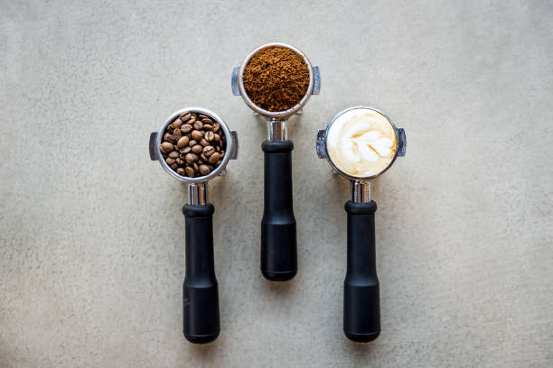 istock Ground coffee in porta filter with beans 921287184
