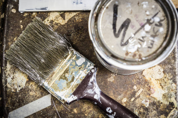 istock Paint Brush on a rusted metal table 921287394