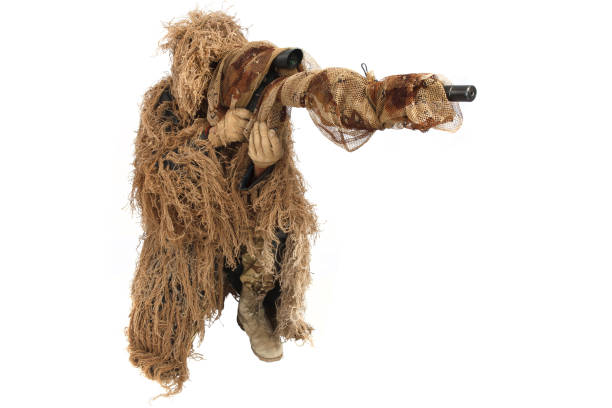 istock sniper in ghillie suit isolated on white 921287732