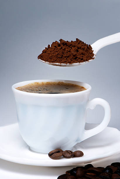 Spoon and Cup of coffee stock photo