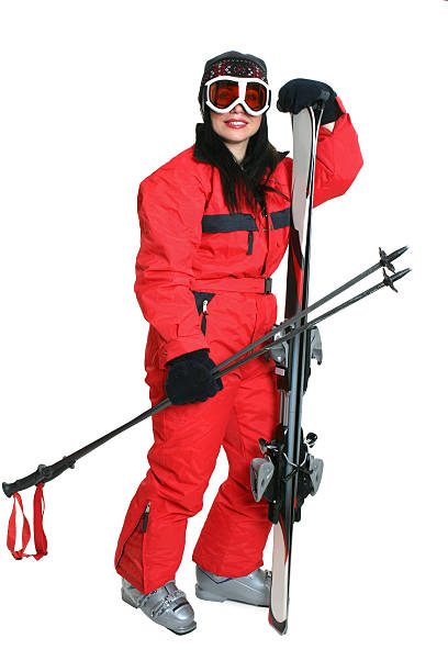 hembra esquiador en rojo y traje de esquí - mono ski fotografías e imágenes de stock