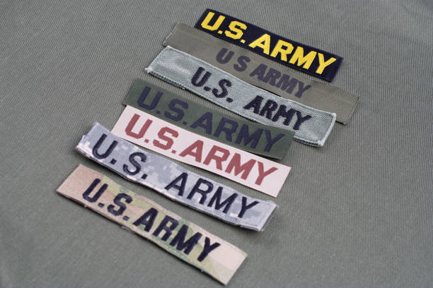 istock US military service tapes on olive green uniform background 921302022