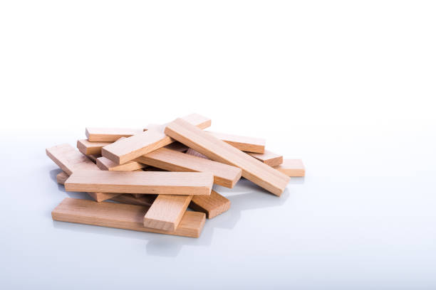 istock Wooden blocks, children development toys, reflection and shadows on surface, 921302410