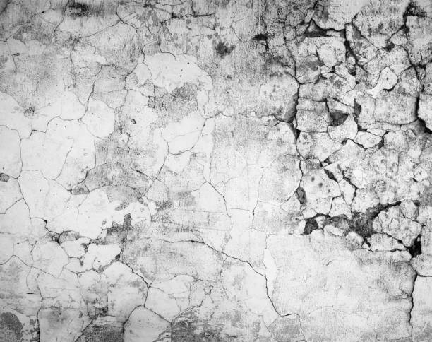 istock Close-up gray grunge old cracked wall texture 921305122
