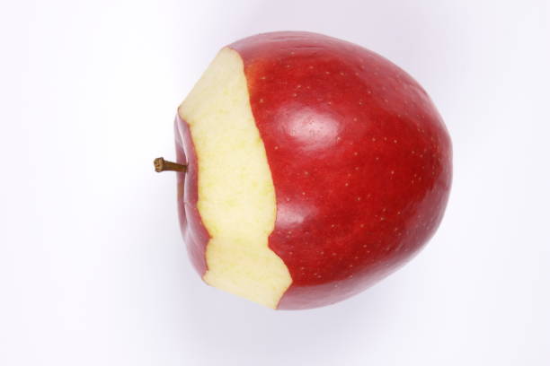 istock Peeled red apple on white background, isolated apple, fruit close-up, apple for designer, billet, slices of apple on white background, vegetarianism, healthy food 921305816
