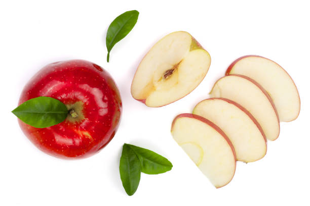 istock red apples with slices and leaves isolated on white background top view. Set or collection. Flat lay pattern 921311802
