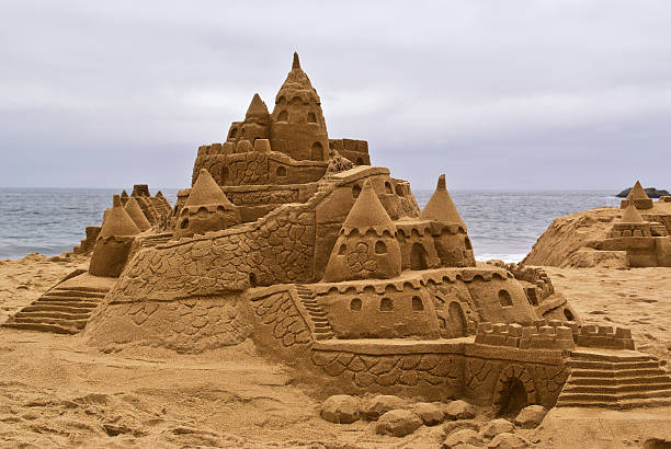 istock Sandcastle the beach, with ocean in background. 92131317