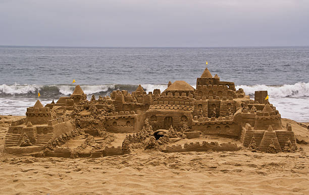 istock Sandcastle the beach, with ocean in background. 92131333