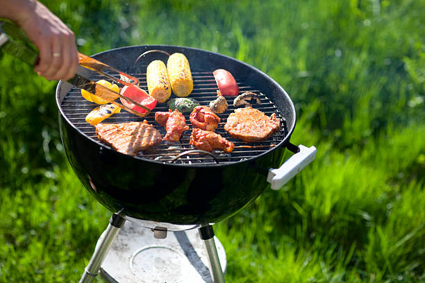 istock Meat and vegetables grilling on a small barbeque 92131374