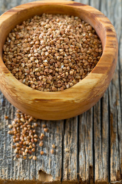 istock Buckwheat on a wooden background 921315718