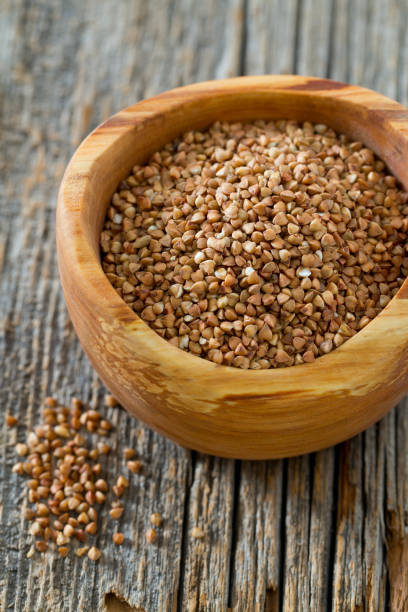istock Buckwheat on a wooden background 921315756