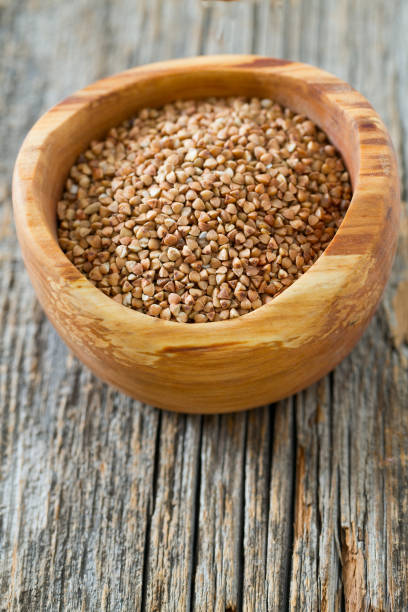 istock Buckwheat on a wooden background 921315802