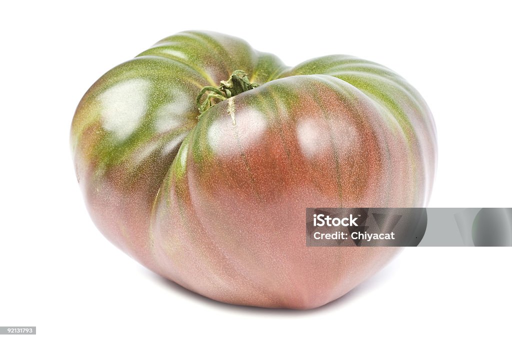 Tomate Heirloom Aislado en blanco - Foto de stock de Alimento libre de derechos