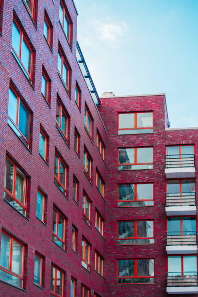 istock red brick apartment building with modern facade 921318048