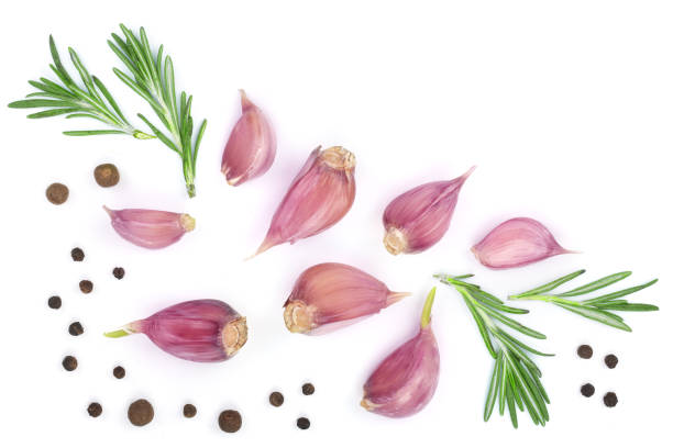 istock garlic with rosemary and peppercorn isolated on white background with copy space for your text. Top view. Flat lay 921318470