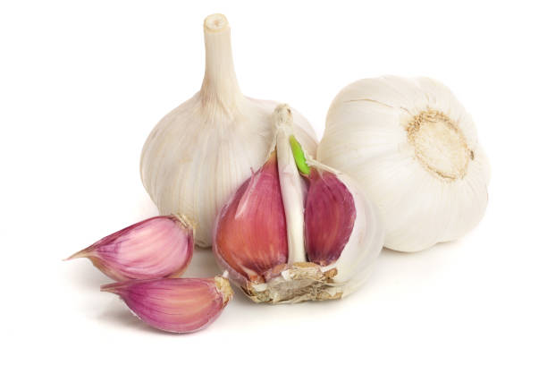 istock garlic isolated on white background close up 921318916