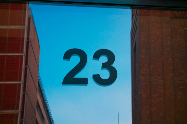 istock number 23 door sign with glass reflections 921321254