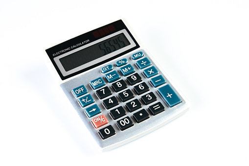 Calculator isolated on white background with copy space, close-up. Silver calculator on white background as background business concept and Education concept
