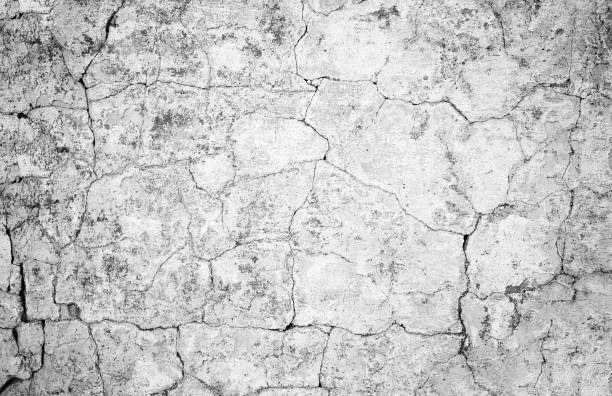 istock Close-up gray grunge old cracked wall texture 921321894