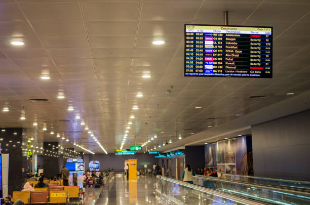 International departure gate in Kempegowda airport in Bangalore, India. Bangalore, India - January 19 2018 : International departure gate in Kempegowda International airport at night in Bangalore, India. bangalore stock pictures, royalty-free photos & images