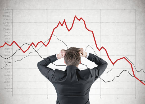 istock Businessman in terror, graphs concrete 921324724