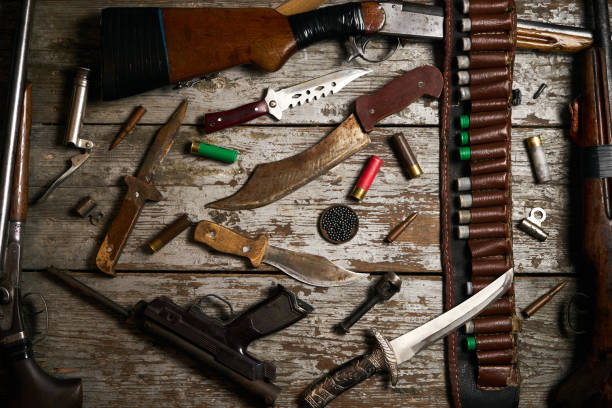 istock Hunting equipment on wooden background 921325098