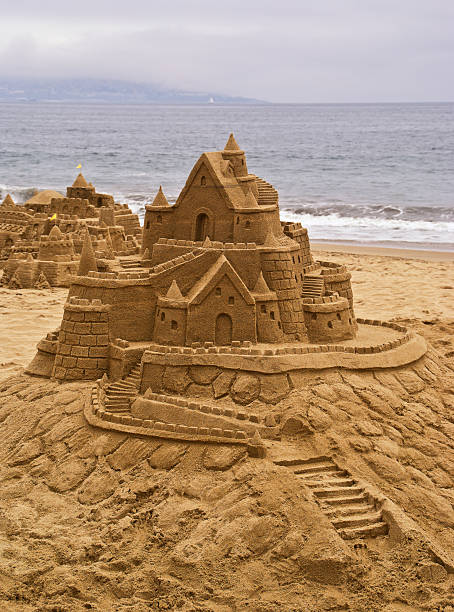 istock Sandcastle the beach, with ocean in background. 92132671