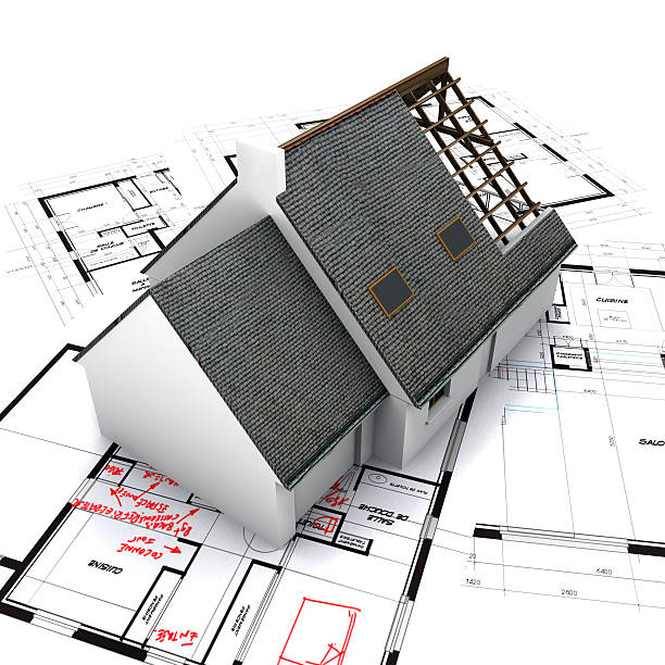 istock house on blueprints with handwritten corrections 92132717