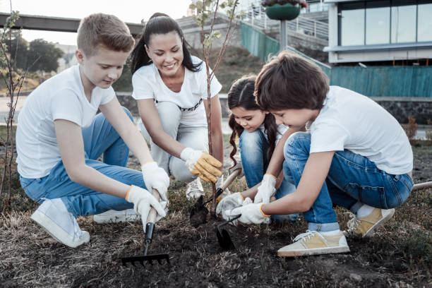 istock Joyful positive people working together 921335136