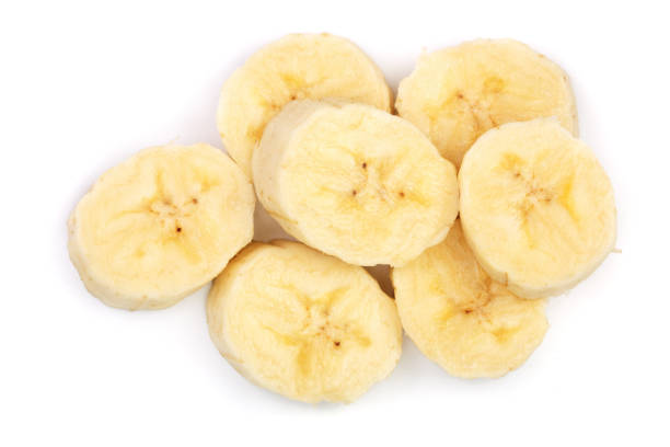 istock banana sliced isolated on white background. Top view. Flat lay 921335628