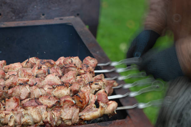 istock meat skewers on the barbecue coals 921338104