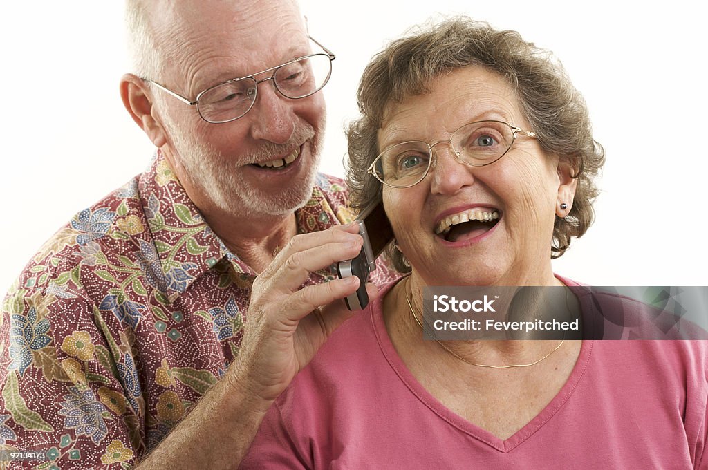 Senior Couple avec téléphone portable - Photo de Adulte libre de droits