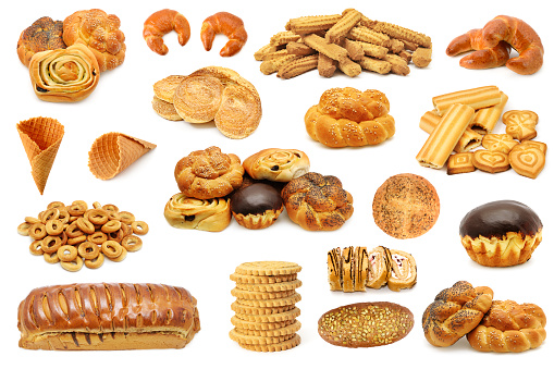 Set bread baked products (biscuits, cookies, cupcake, roll) isolated on white background.