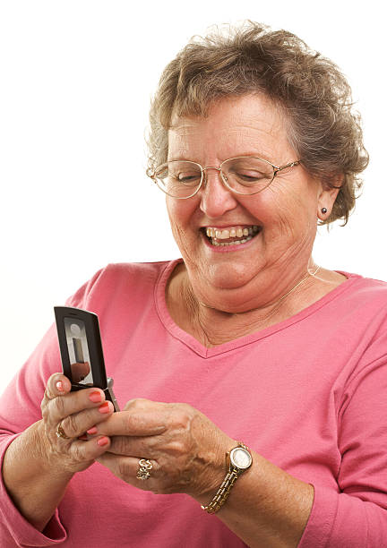 istock Senior Woman with Cell Phone 92134199