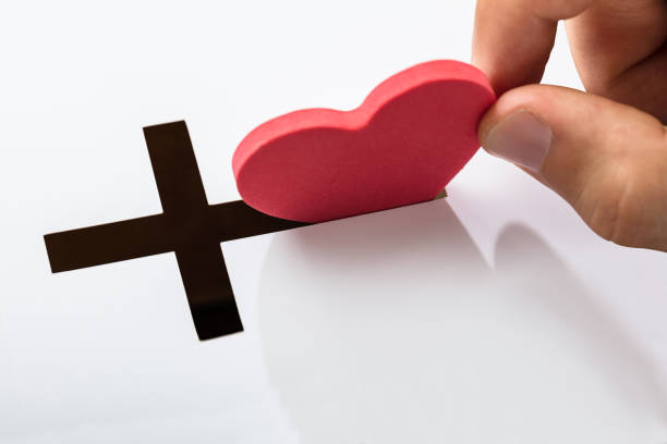 istock Insert Heart Shape In Crucifix Slot 921342136