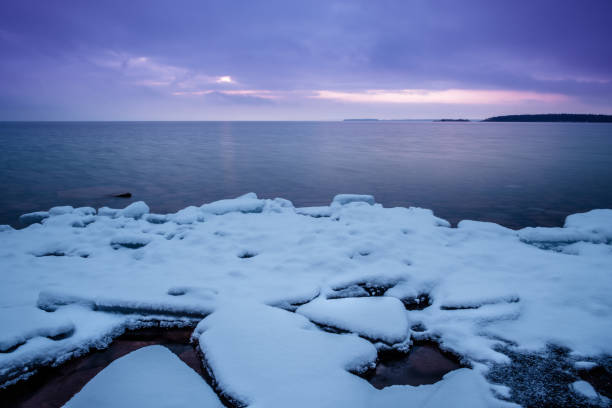 istock Ice and snow on a lake at sunset 921342700
