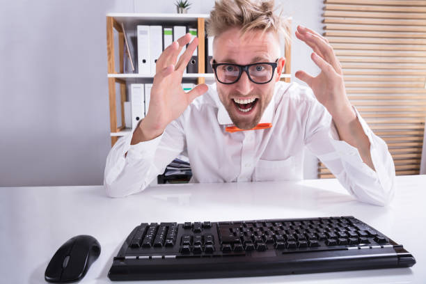 istock Keyboard In Front Of Pointing Businessman 921343250
